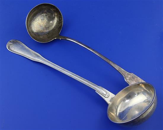 A George III silver fiddle pattern soup ladle and a 19th century French silver soup ladle, 16 oz.